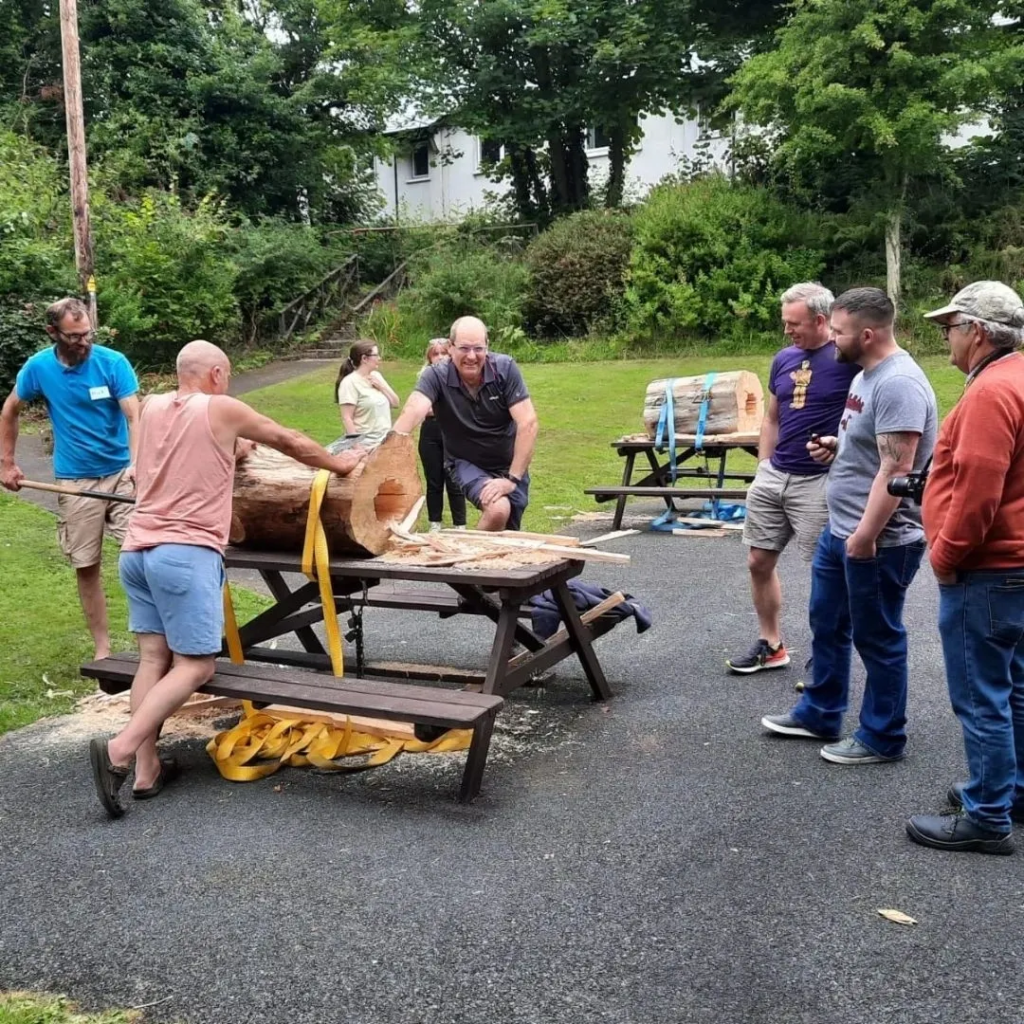 The group at beefest 2022 learning the basics of how to make a loghive